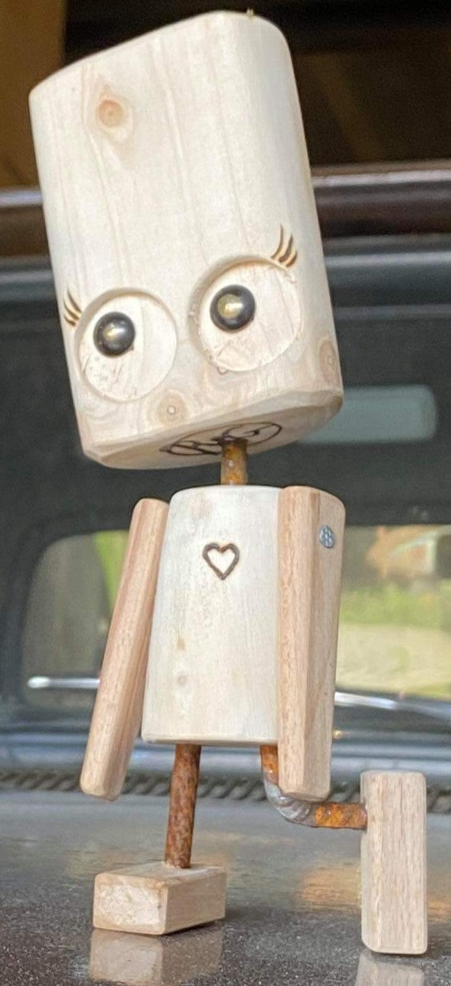 Her ser man figureren Fru. Godt 